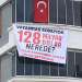 MHP’li isim balkonuna 128 milyar nerede pankartı astı