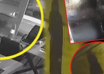 Dükkan girişine gizemli işaretler çizen kadın korku yarattı