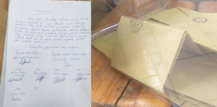 Dışardan getirdiği zarfları sandığa attı